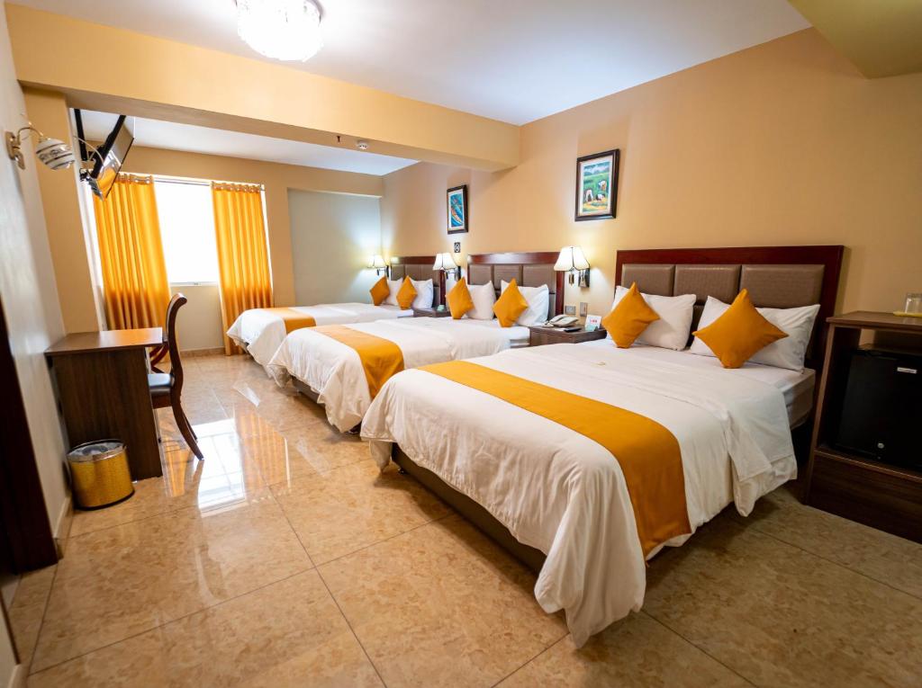 Postel nebo postele na pokoji v ubytování Gran Recreo Hotel - Trujillo - Perú
