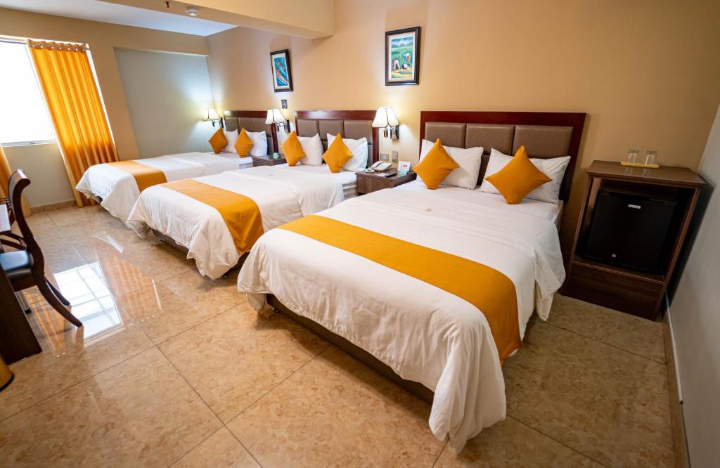 Postel nebo postele na pokoji v ubytování Gran Recreo Hotel - Trujillo - Perú