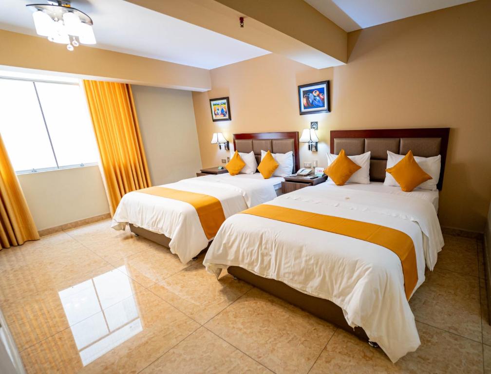 Postel nebo postele na pokoji v ubytování Gran Recreo Hotel - Trujillo - Perú