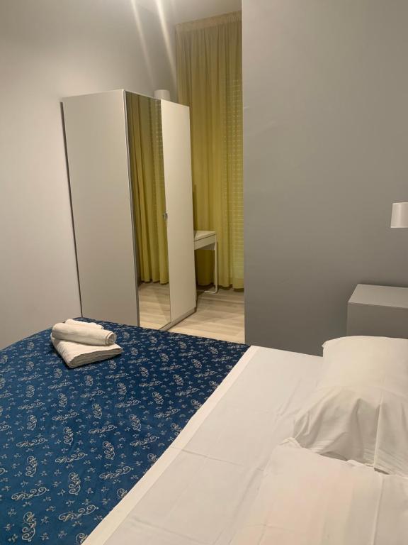 Postel nebo postele na pokoji v ubytování Hotel Sissi