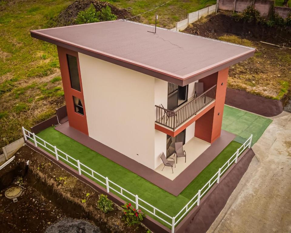 an overhead view of a small house with a balcony at Toucan Villa Rio Cuarto in Río Cuarto