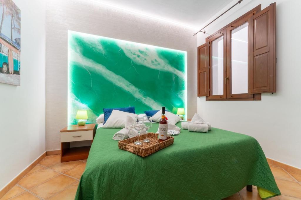 Postel nebo postele na pokoji v ubytování "L'Oasi di Favignana" Room and Charme