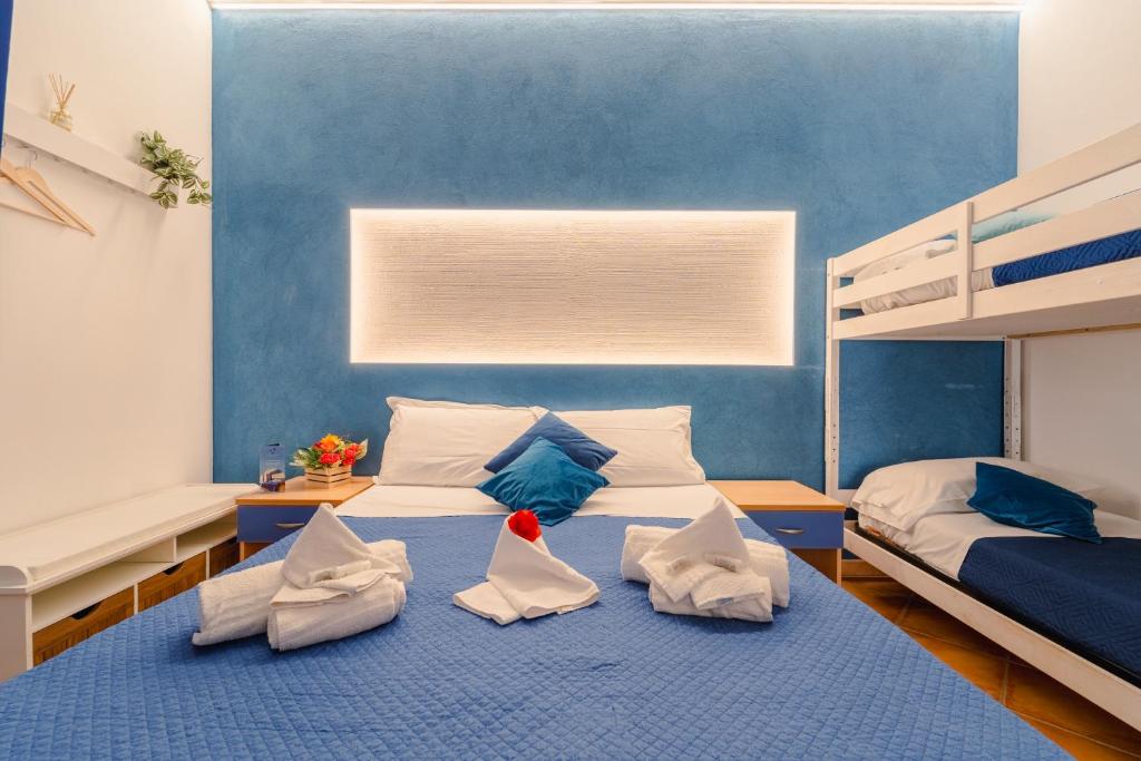 Postel nebo postele na pokoji v ubytování "L'Oasi di Favignana" Room and Charme