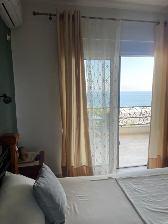 Postel nebo postele na pokoji v ubytování Guesthouse HHL - Liman ll