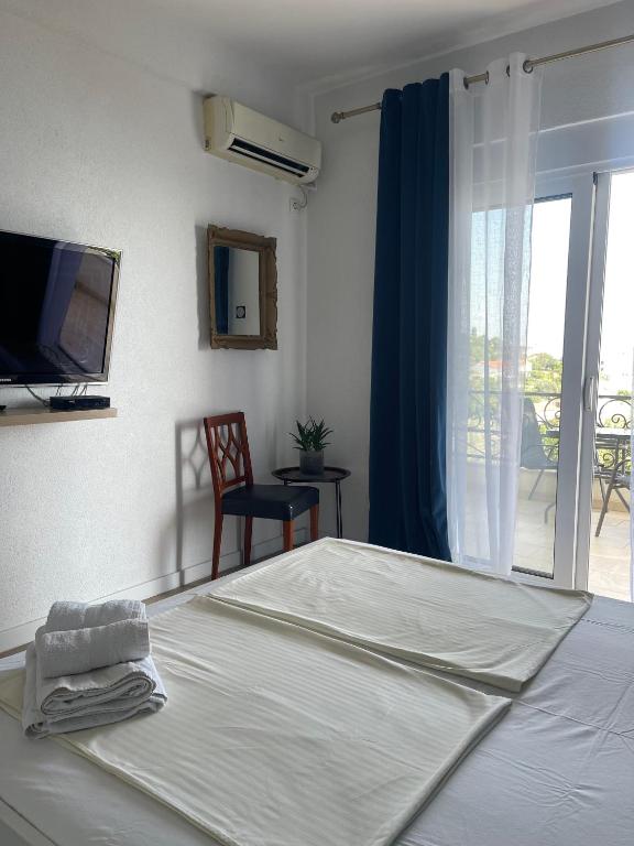 Postel nebo postele na pokoji v ubytování Guesthouse HHL - Liman ll