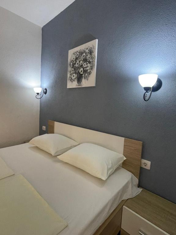 Postel nebo postele na pokoji v ubytování Guesthouse HHL - Liman ll