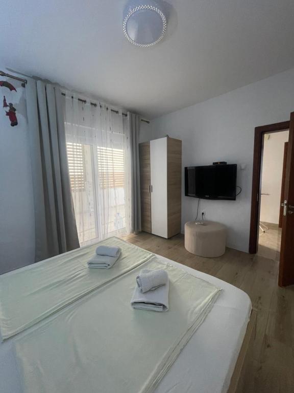 TV a/nebo společenská místnost v ubytování Guesthouse HHL - Liman ll