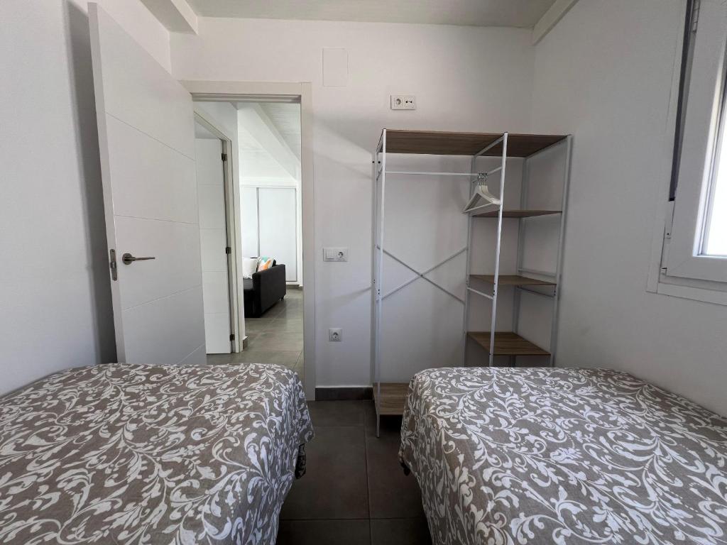 Postel nebo postele na pokoji v ubytování Los Ventanales II