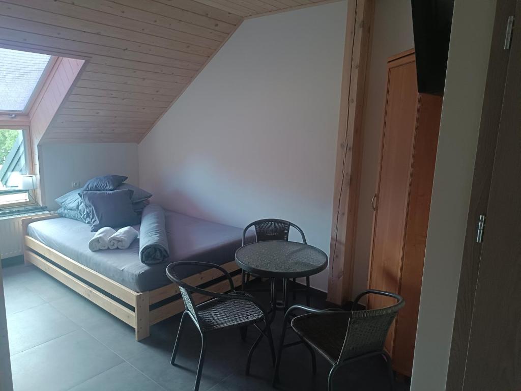 Posezení v ubytování Agroturystyka Żuczek nad jeziorem