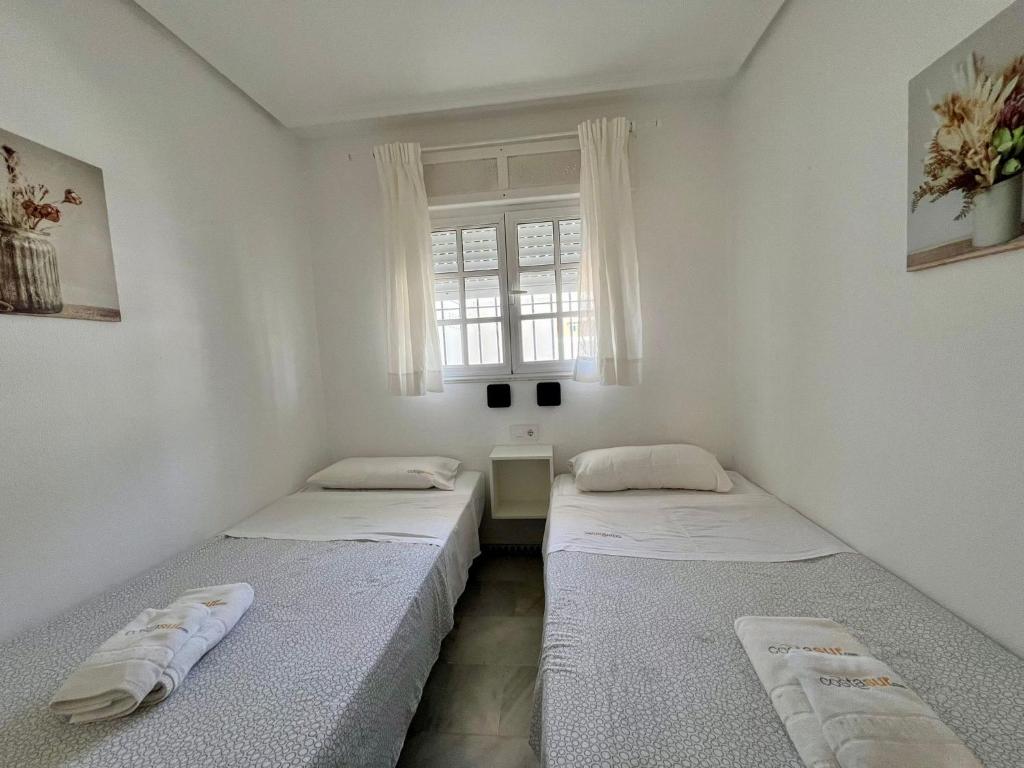 Postel nebo postele na pokoji v ubytování Apartamento Columela