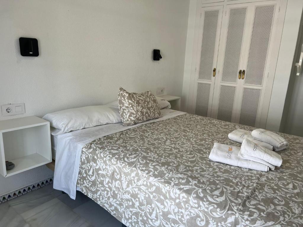 Postel nebo postele na pokoji v ubytování Apartamento Columela