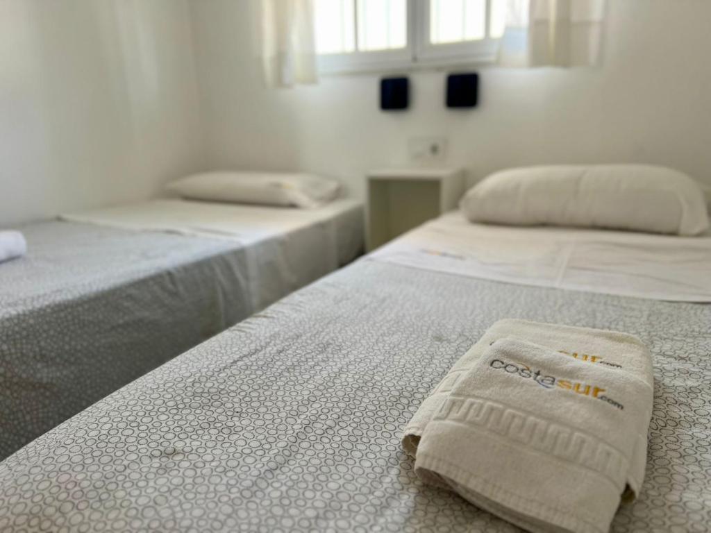 Postel nebo postele na pokoji v ubytování Apartamento Columela