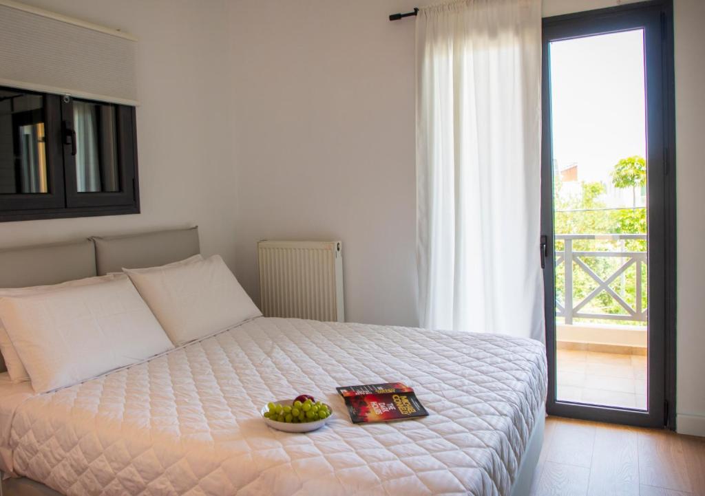 Postel nebo postele na pokoji v ubytování Aetheris Home