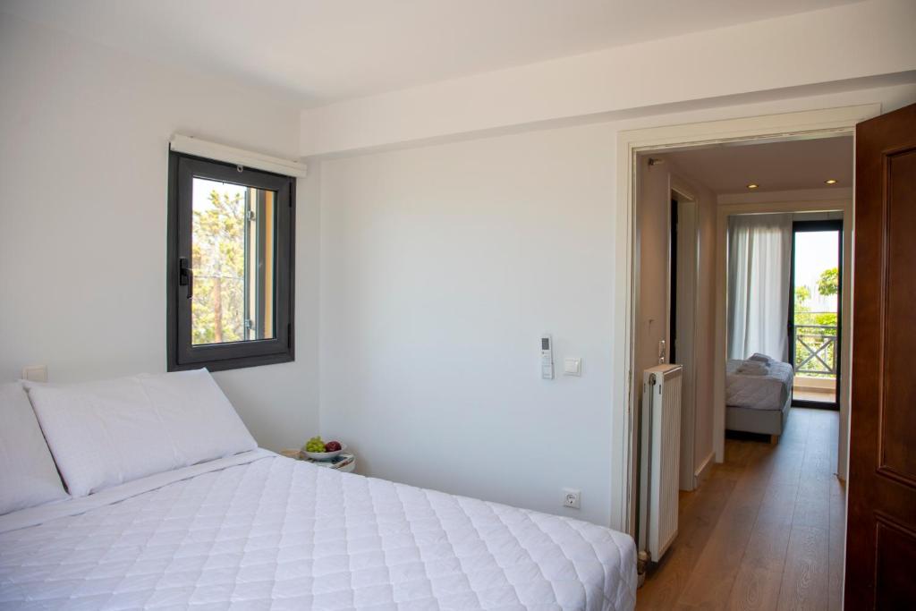 Postel nebo postele na pokoji v ubytování Aetheris Home