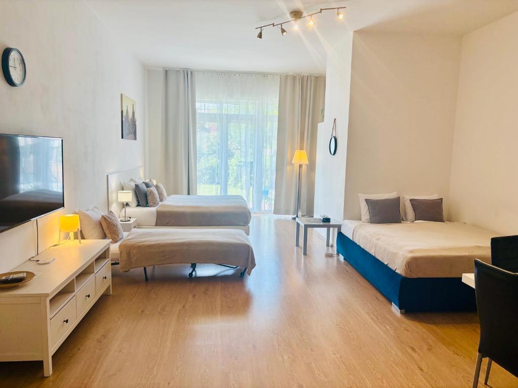 Postel nebo postele na pokoji v ubytování Maria Apartments - Free Parking