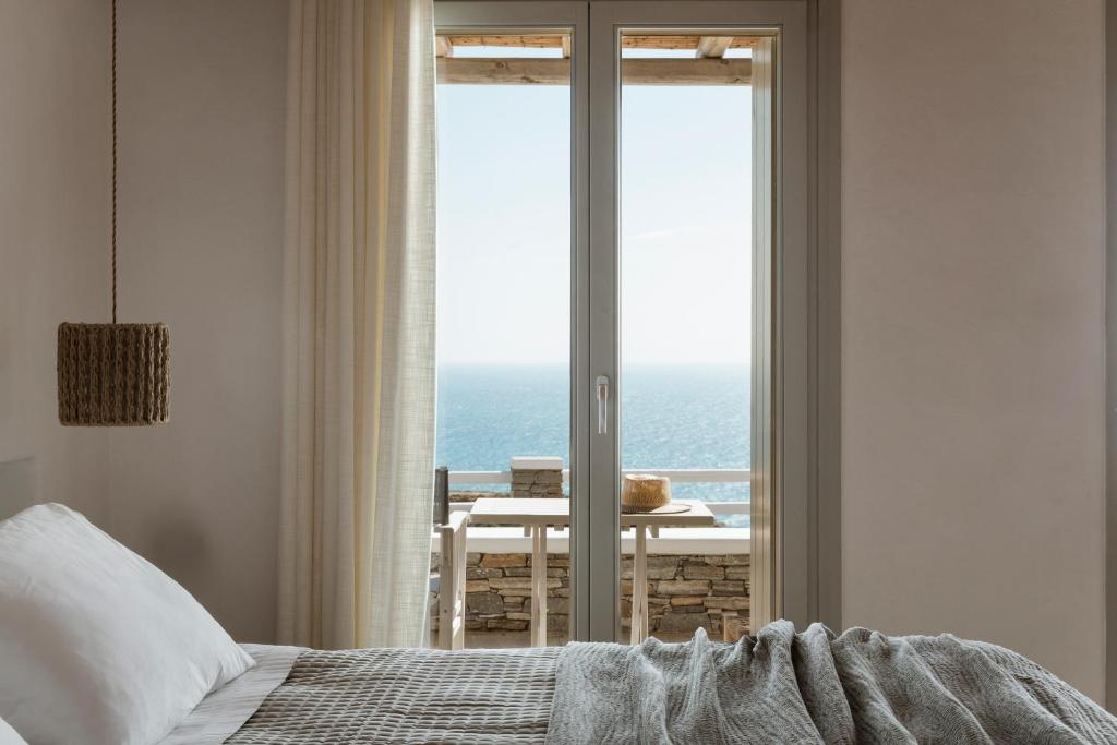 Postel nebo postele na pokoji v ubytování Gerofinikas Boutique Hotel