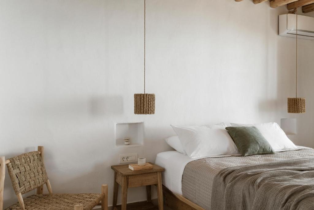 Postel nebo postele na pokoji v ubytování Gerofinikas Boutique Hotel