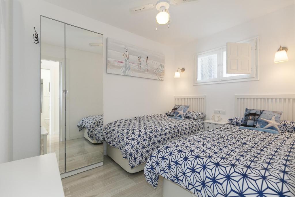 Postel nebo postele na pokoji v ubytování UHC RODAS APARTMENTS
