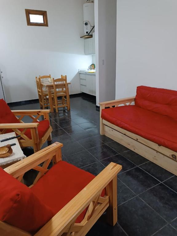 En eller flere senge i et værelse på Poncho ANDINO