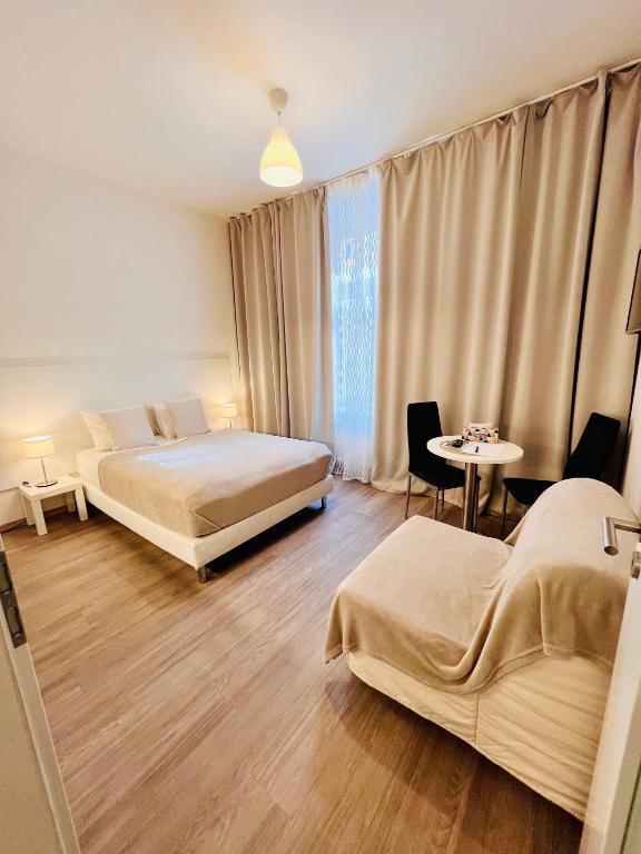 Postel nebo postele na pokoji v ubytování Maria Apartment Liben