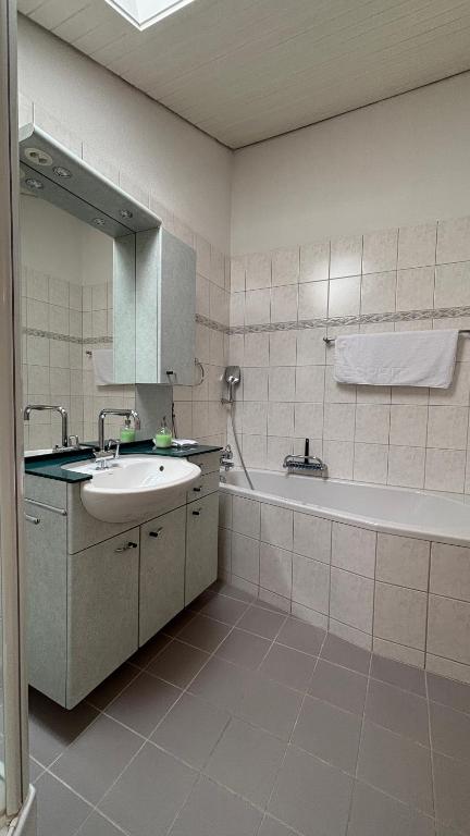 Koupelna v ubytování Garden Park Apartment