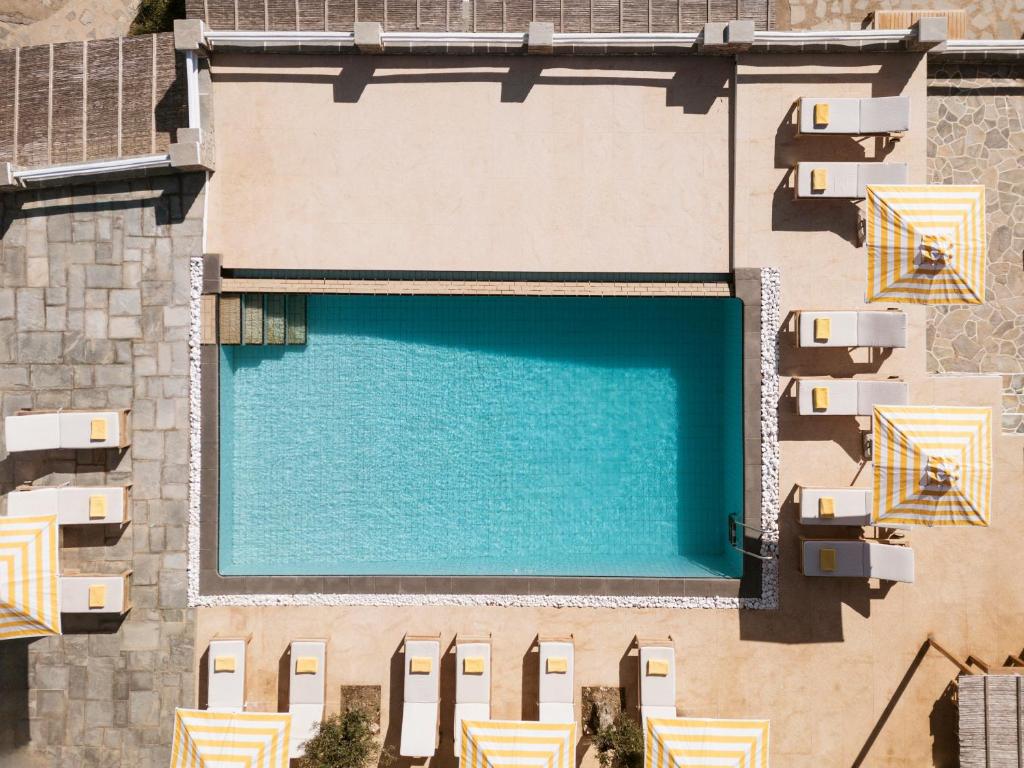 Bazén v ubytování Gerofinikas Boutique Hotel nebo v jeho okolí