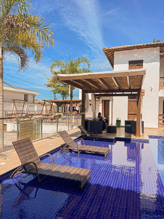 Bazén v ubytování Hotel Encantos de Itaperapuã nebo v jeho okolí