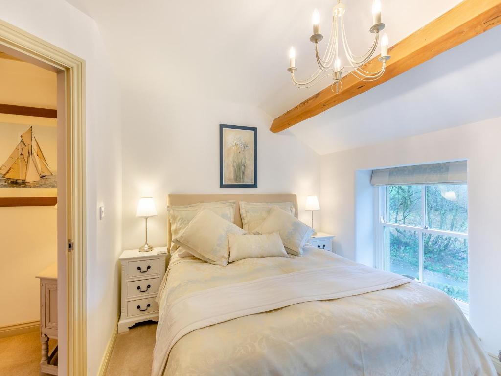 Postel nebo postele na pokoji v ubytování Graydon Cottage