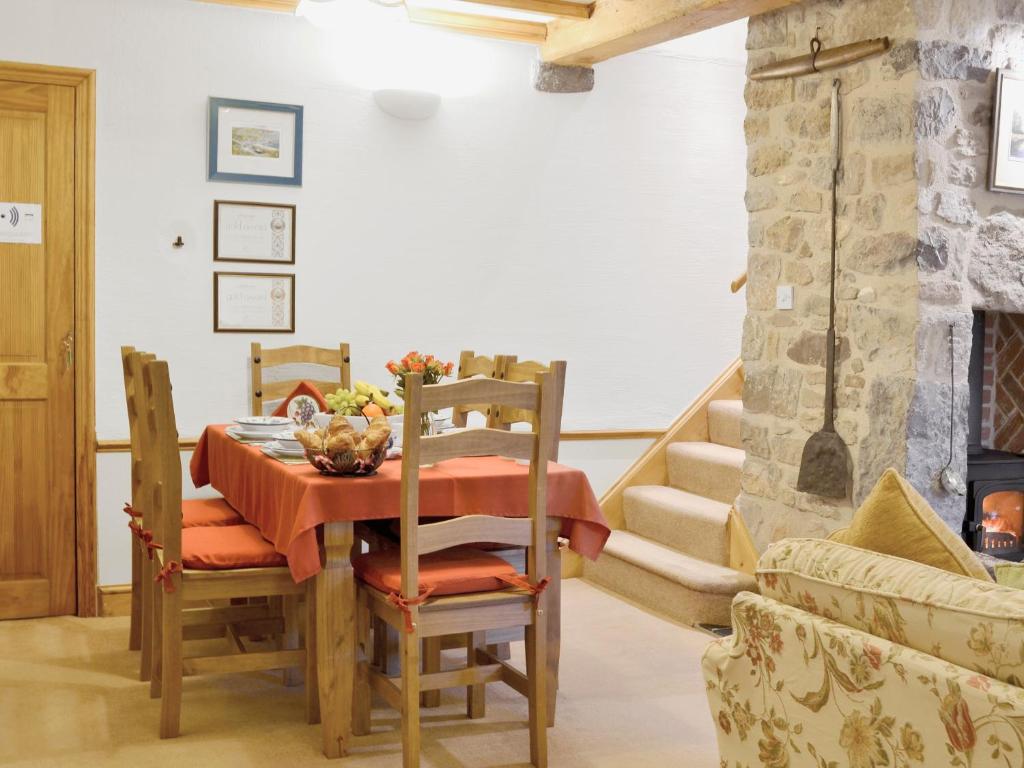 Posezení v ubytování Granary Cottage