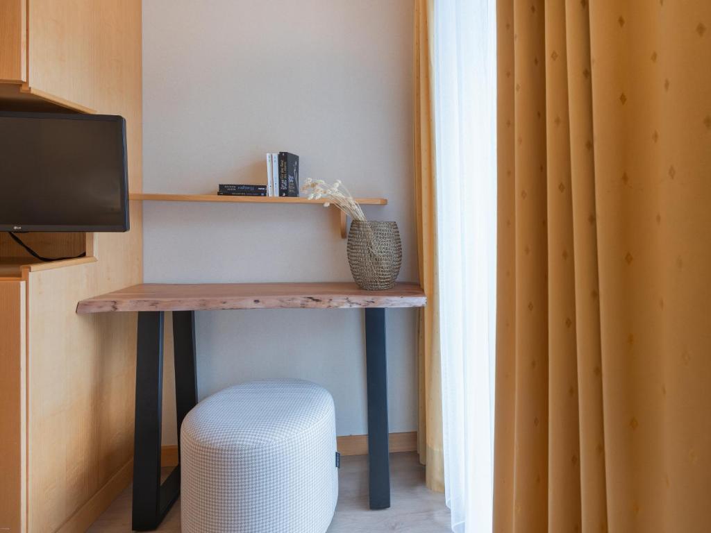 TV a/nebo společenská místnost v ubytování Hotel Nocker