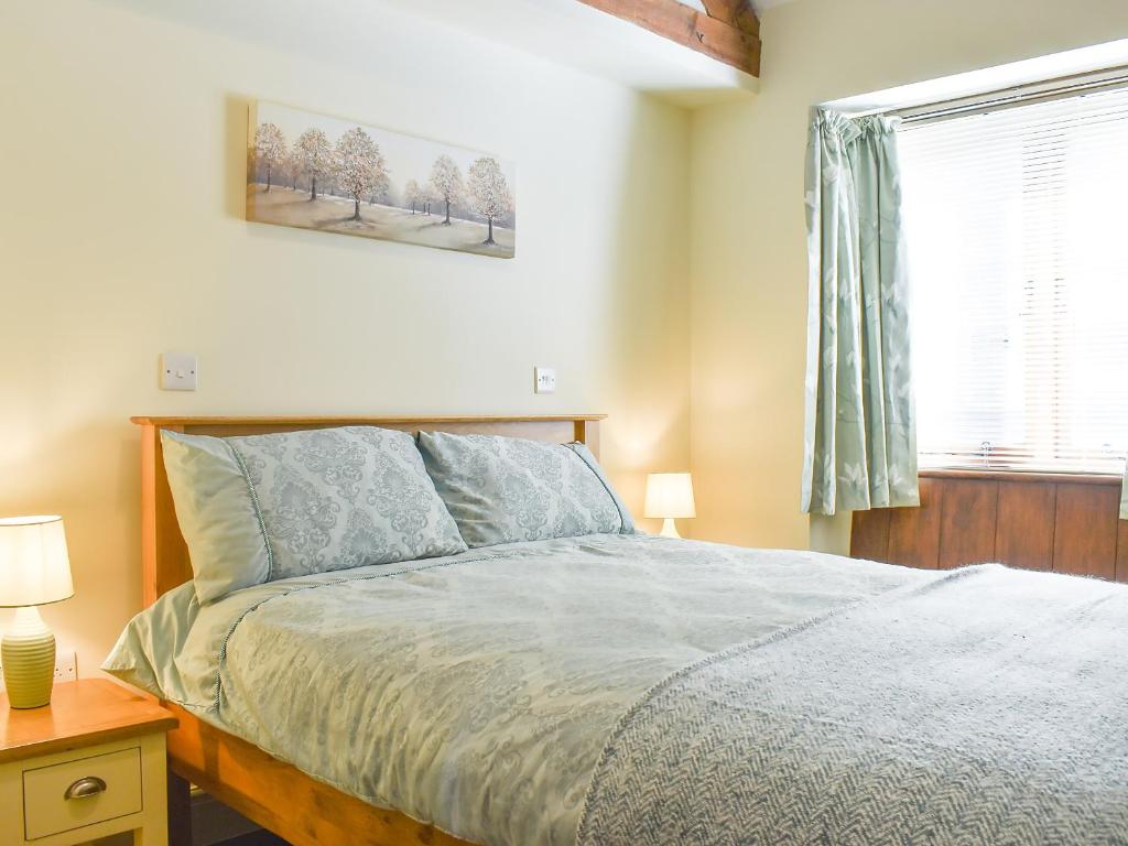 Postel nebo postele na pokoji v ubytování Cedar Barn