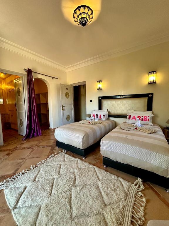 Postel nebo postele na pokoji v ubytování Le Rubis Oriental Marrakech