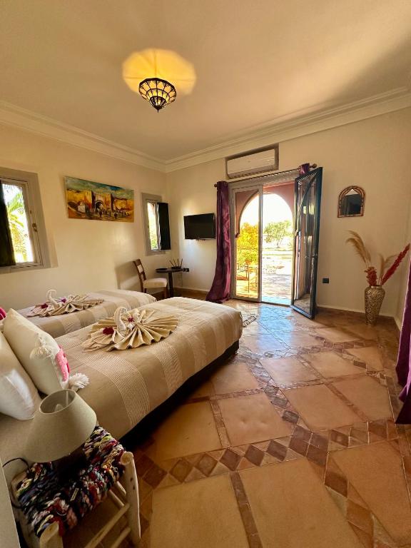 Postel nebo postele na pokoji v ubytování Le Rubis Oriental Marrakech