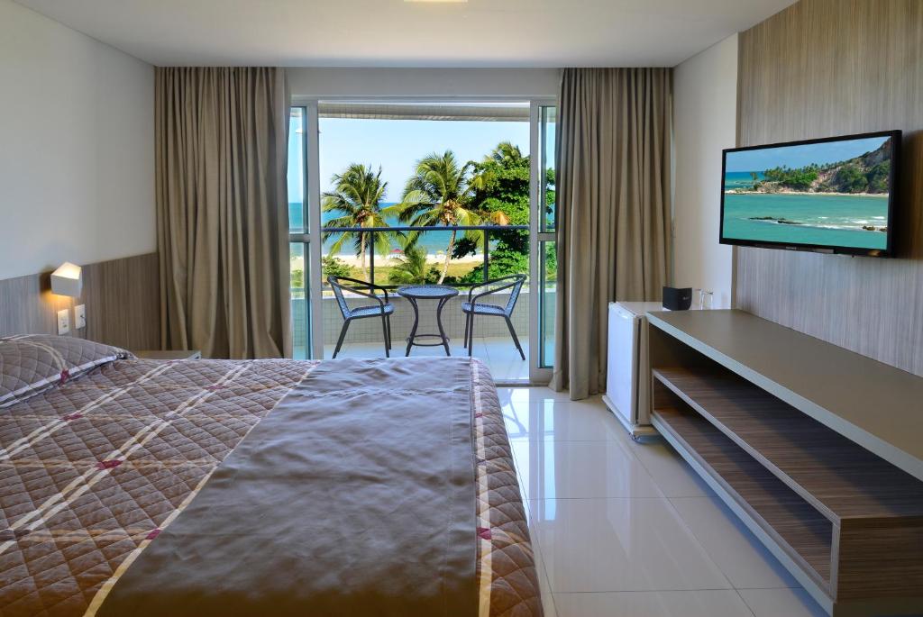 Cama ou camas em um quarto em Nord Luxxor Cabo Branco