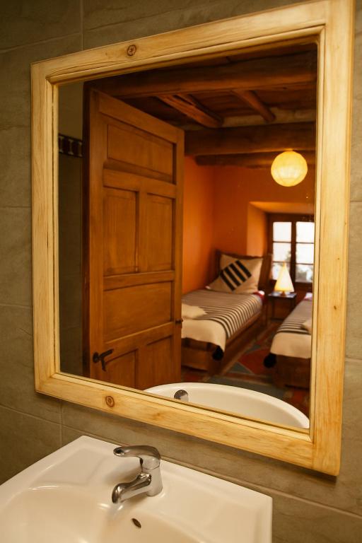 Postel nebo postele na pokoji v ubytování Atlas Kasbah Lodge