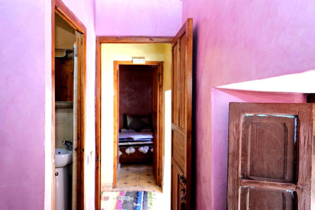 Postel nebo postele na pokoji v ubytování Atlas Kasbah Lodge
