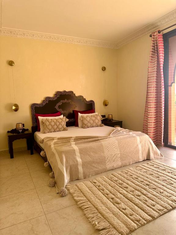 Postel nebo postele na pokoji v ubytování Le Rubis Oriental Marrakech