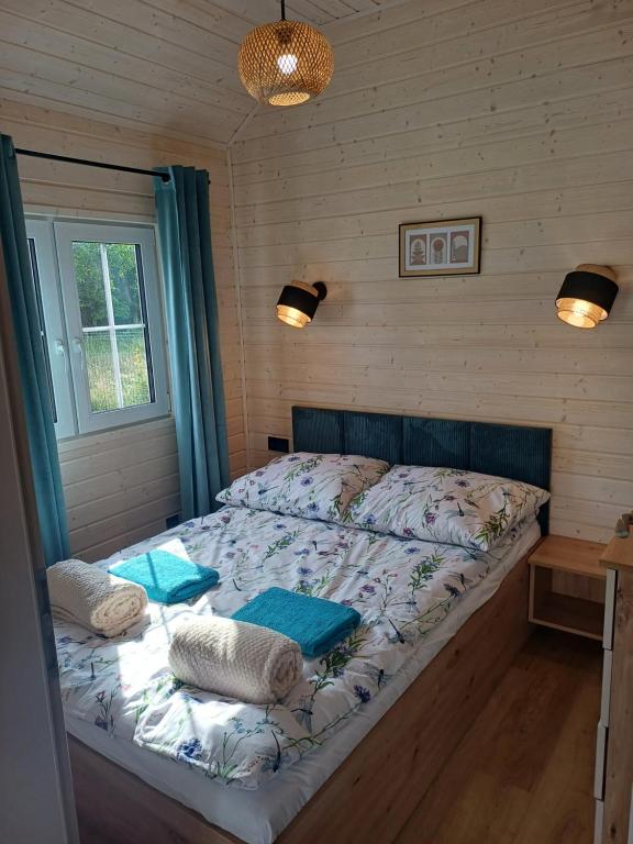 Postel nebo postele na pokoji v ubytování Osada Pana Kraba