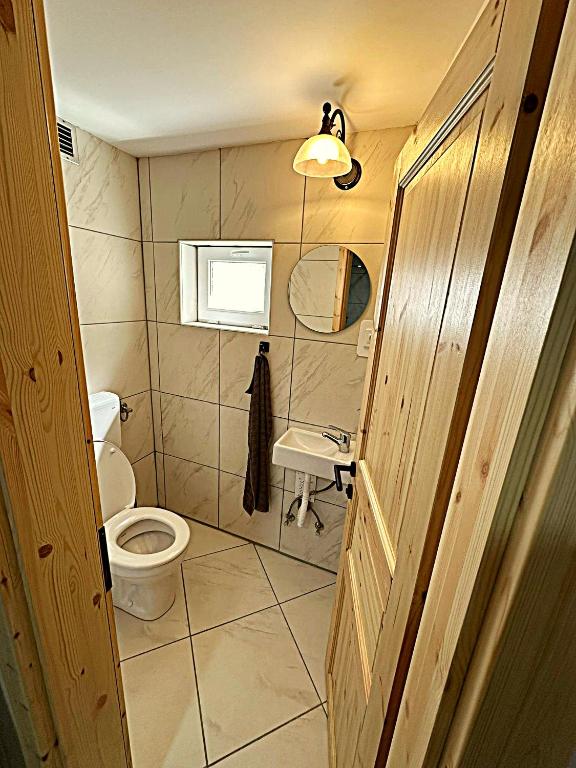 Koupelna v ubytování Apartma Pr'Komarjo