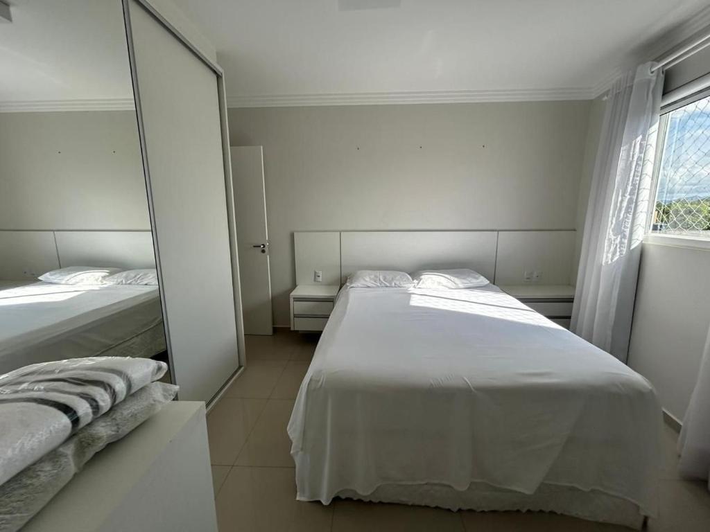 Uma cama ou camas num quarto em Apto Almeida e Moraes Aconchegante em BC