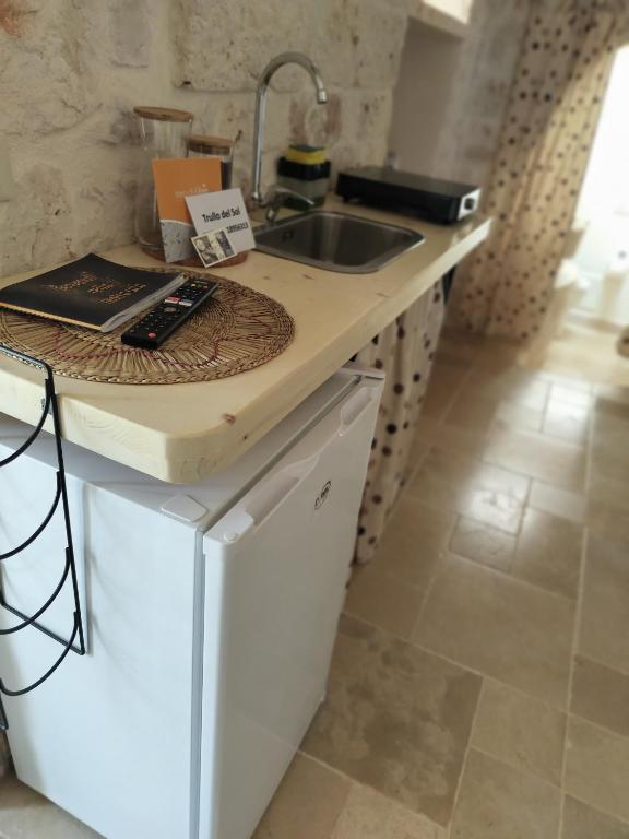 Kuchyň nebo kuchyňský kout v ubytování Trullo del Sol