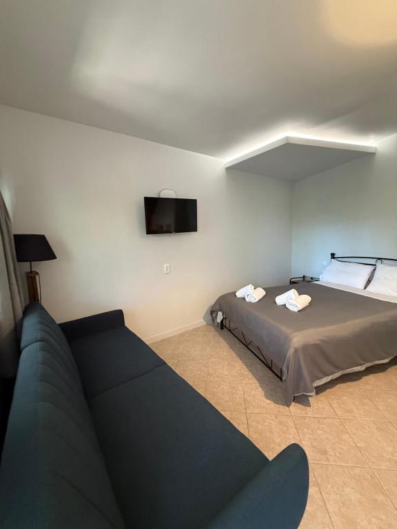 A bed or beds in a room at Panorama Studio