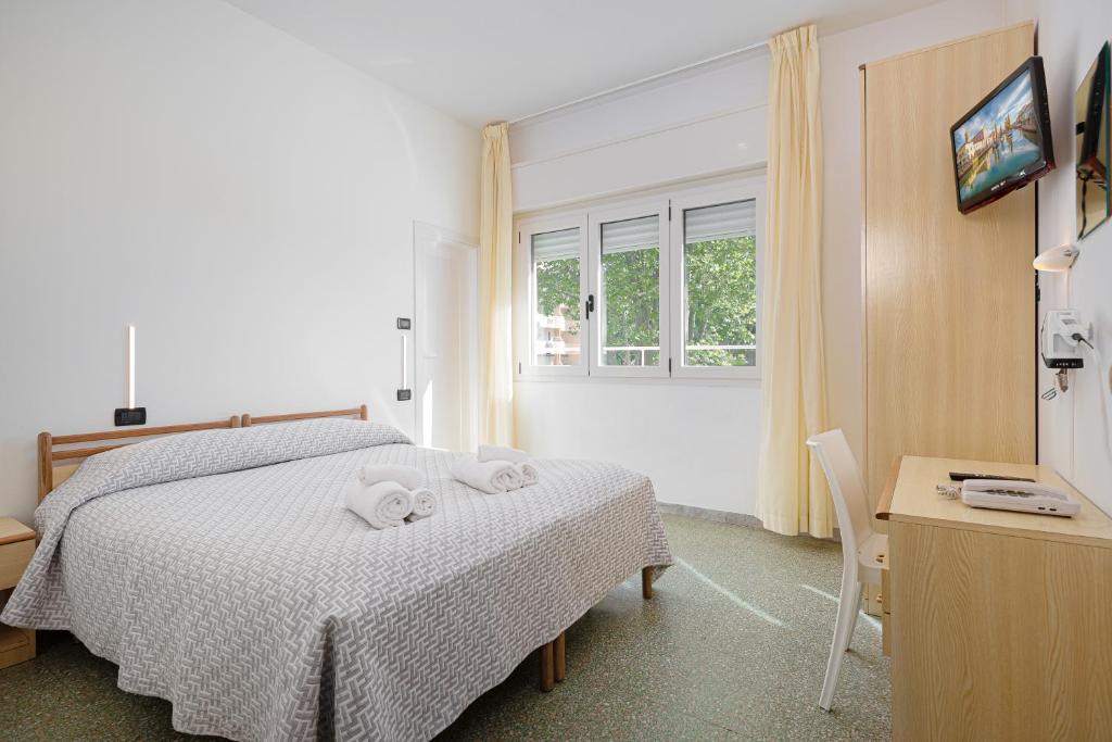 TV a/nebo společenská místnost v ubytování Hotel Altamarea Cesenatico