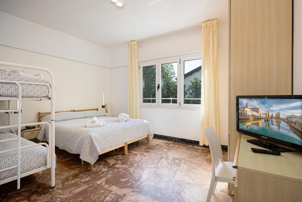Postel nebo postele na pokoji v ubytování Hotel Altamarea Cesenatico
