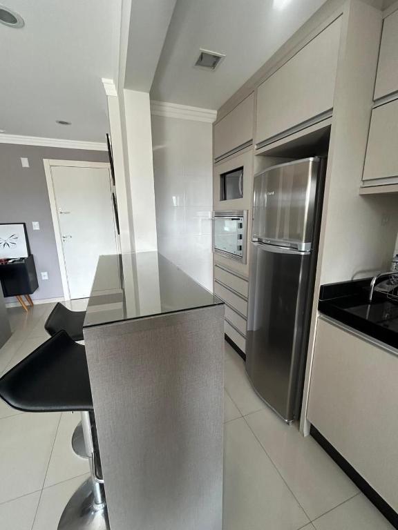 A cozinha ou kitchenette de Apto Almeida e Moraes Aconchegante em BC
