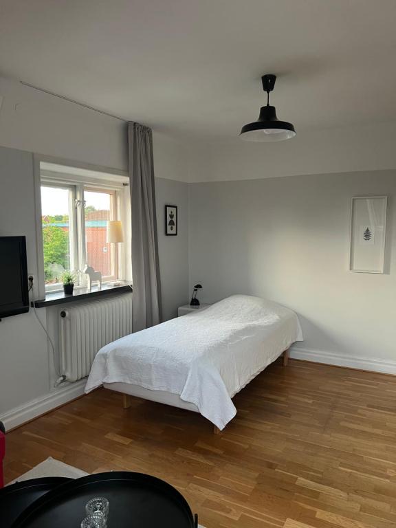 Postel nebo postele na pokoji v ubytování Apartment in Central Ystad