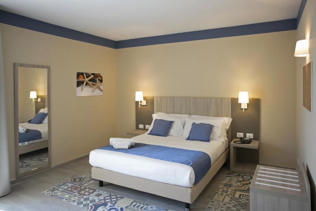 A bed or beds in a room at Map holiday residence