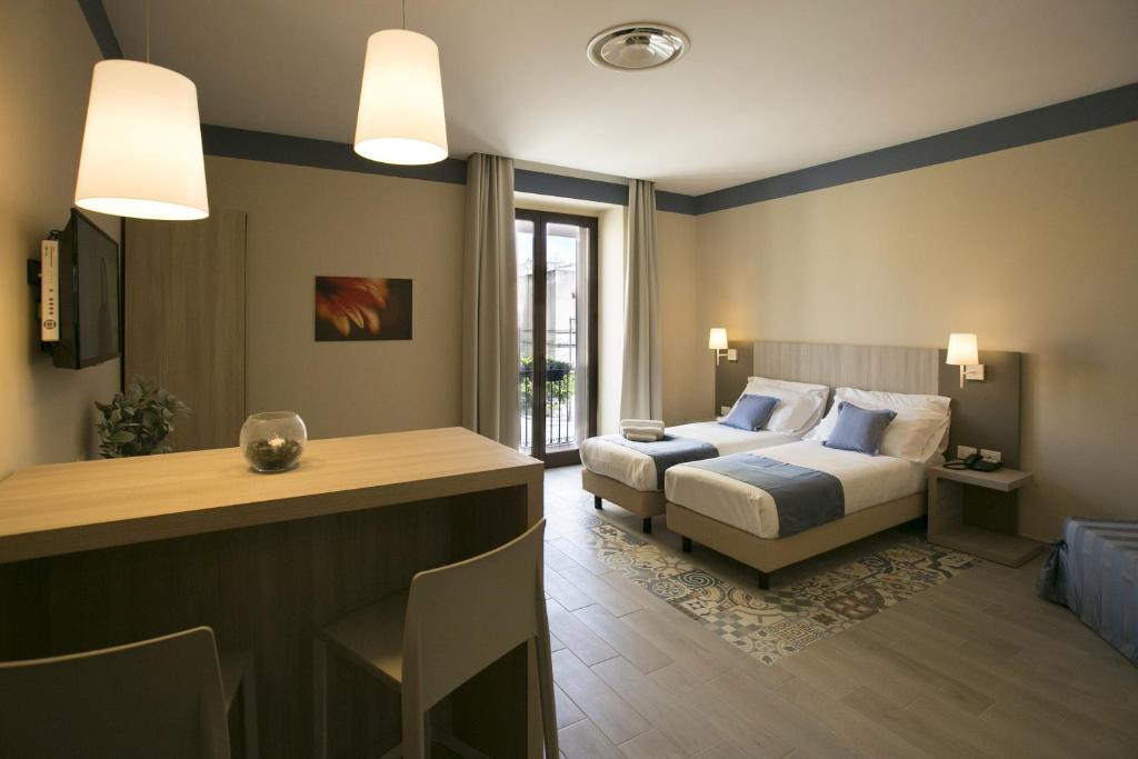 A bed or beds in a room at Map holiday residence