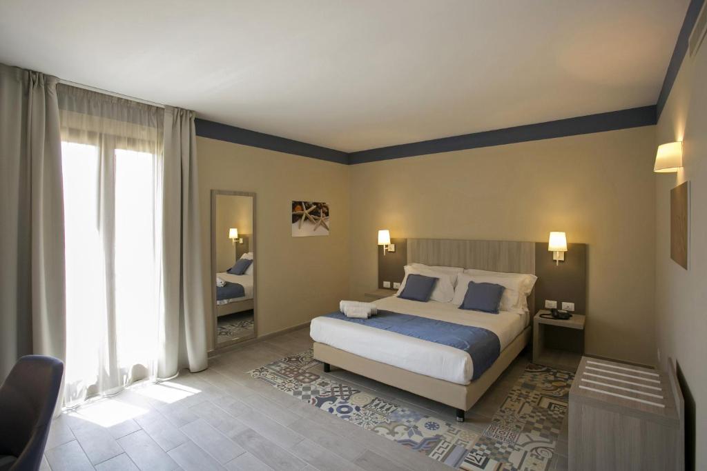 A bed or beds in a room at Map holiday residence