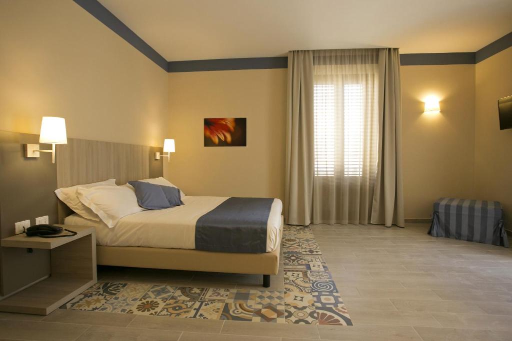 A bed or beds in a room at Map holiday residence